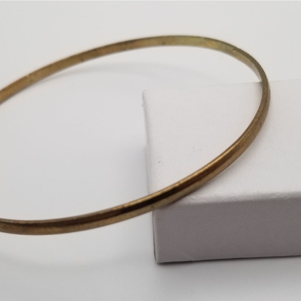 Copper tone bracelet slider. B709
